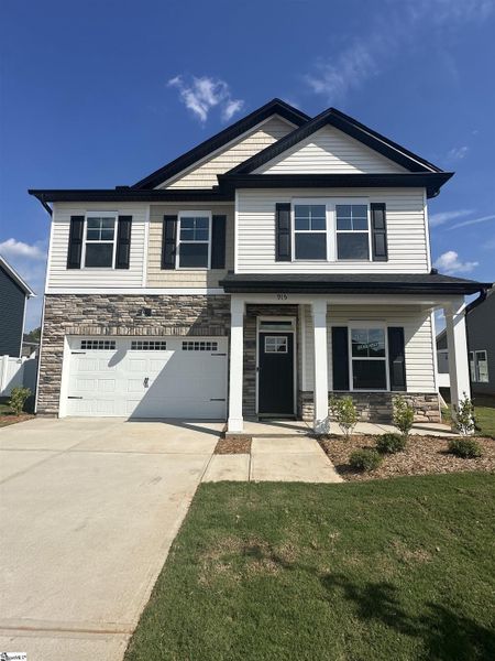 Front exterior of a new home in Shiloh Trail, Wellford, SC, highlighting curb appeal (Image 2).