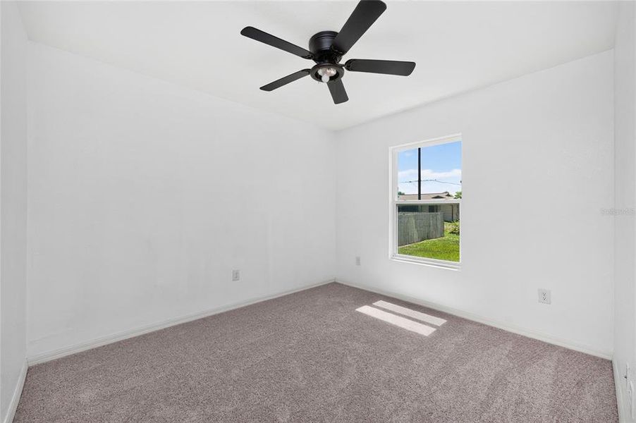 Spacious, unfurnished interior of a new home in , Port Charlotte (Image 46).