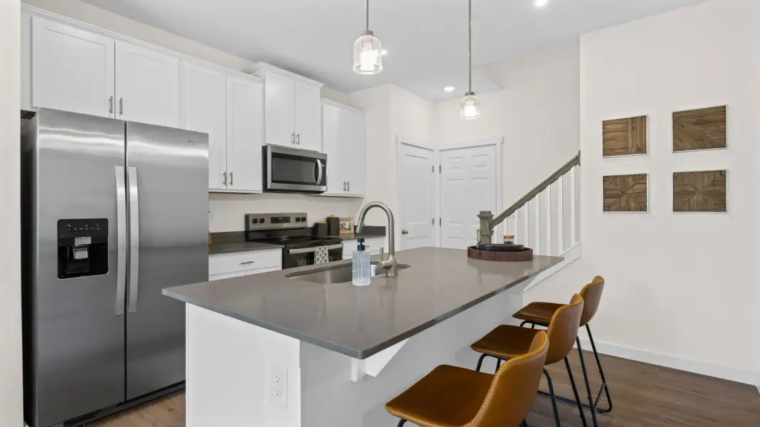 Representative furnished interior of a home built from the Tatum Townhome by D.R. Horton in Cherokee Overlook, Sevierville (Image 3).