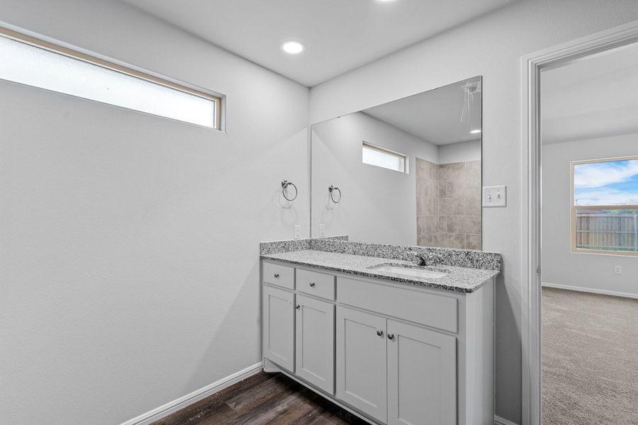 Representative furnished interior of a home built from the KINGSTON by D.R. Horton in Faculty Row, Abilene (Image 20).