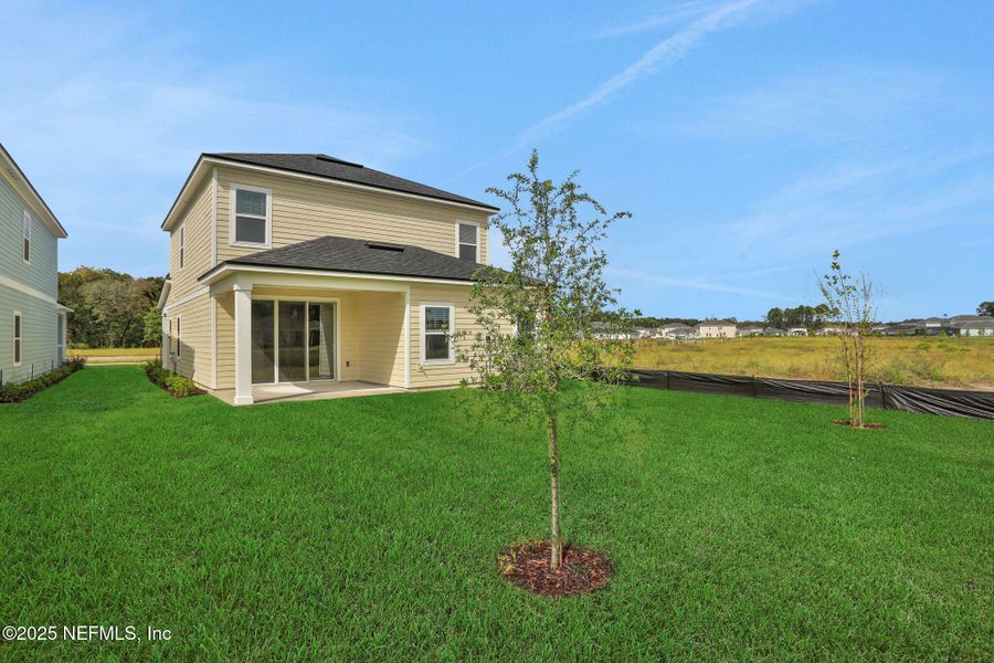 Exterior details and patio area of a home in TrailMark, St. Augustine (Image 2).
