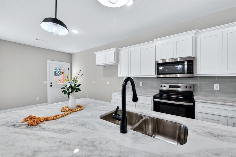 Furnished interior view inside a new home in , Whitesboro (Image 10).