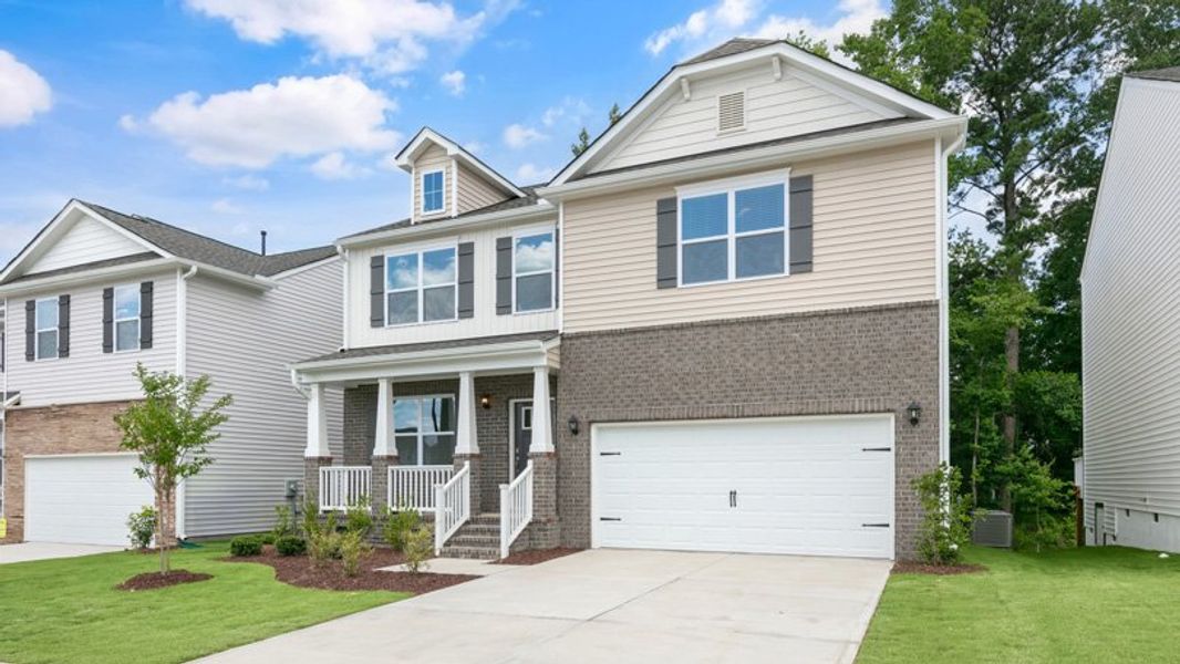 Front exterior of a new home in The Reserve at Prestleigh, Wake Forest, NC, highlighting curb appeal (Image 20).