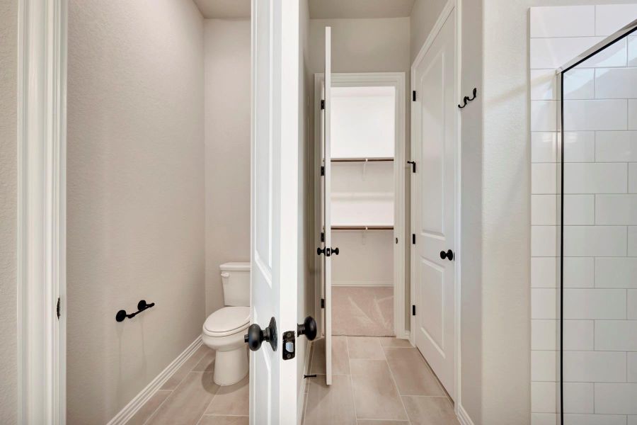 Furnished interior view inside a new home in Heritage, Dripping Springs (Image 5).