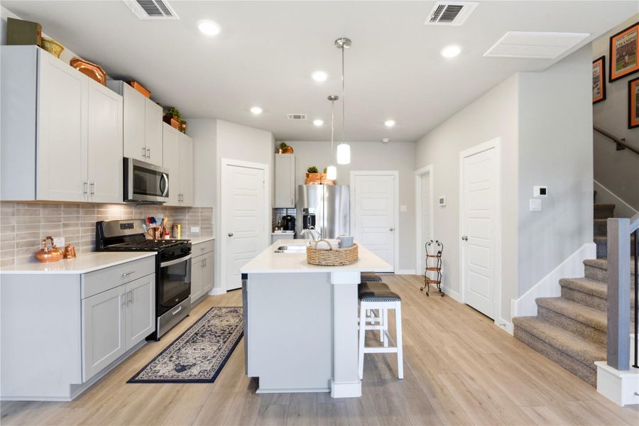 Furnished interior view inside a new home in Dunvale Village - Townhome Collection, Houston (Image 7).