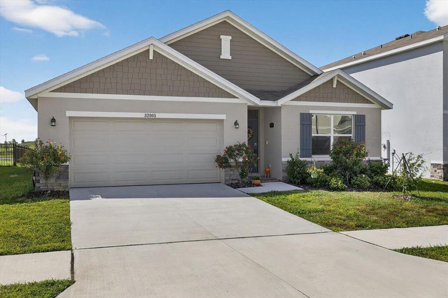 Front exterior of a new home in , San Antonio, FL, highlighting curb appeal (Image 2). Front exterior of a new home in , San Antonio, FL, highlighting curb appeal (Image 2).