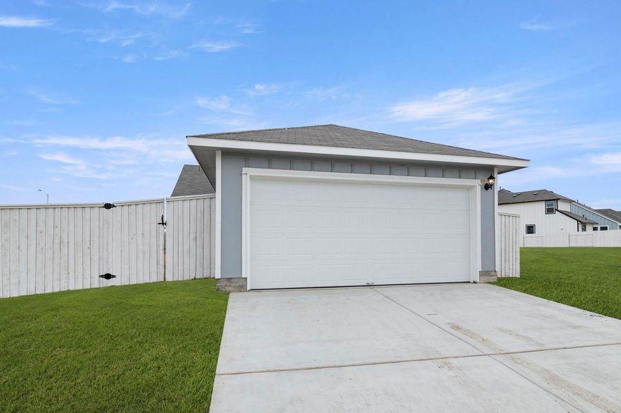 Front exterior of a new home in Casetta Ranch, Kyle, TX, highlighting curb appeal (Image 21).
