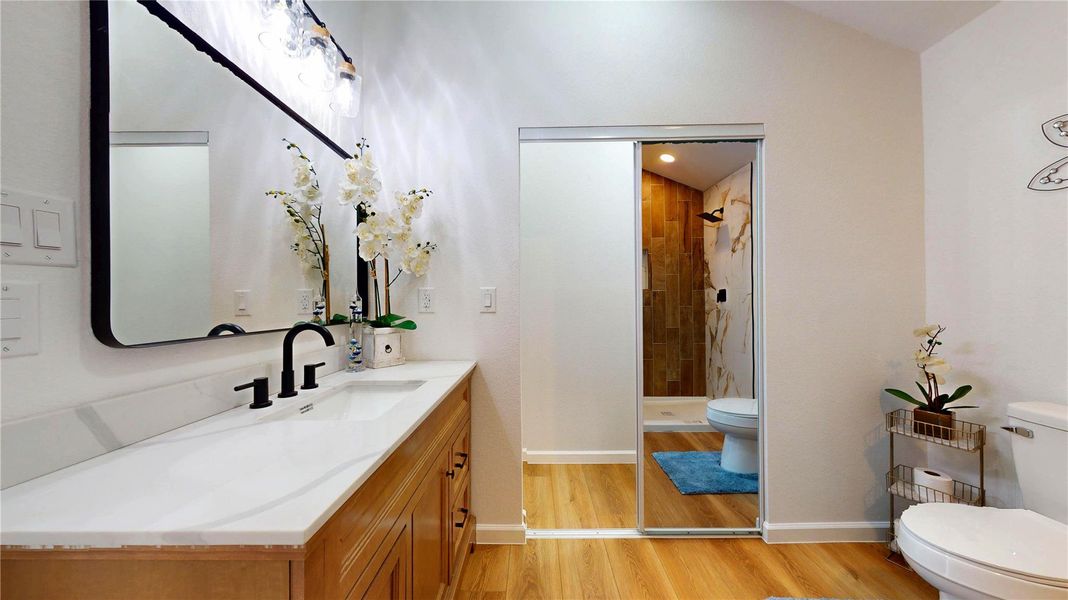 Primary bath with mirror closet doors