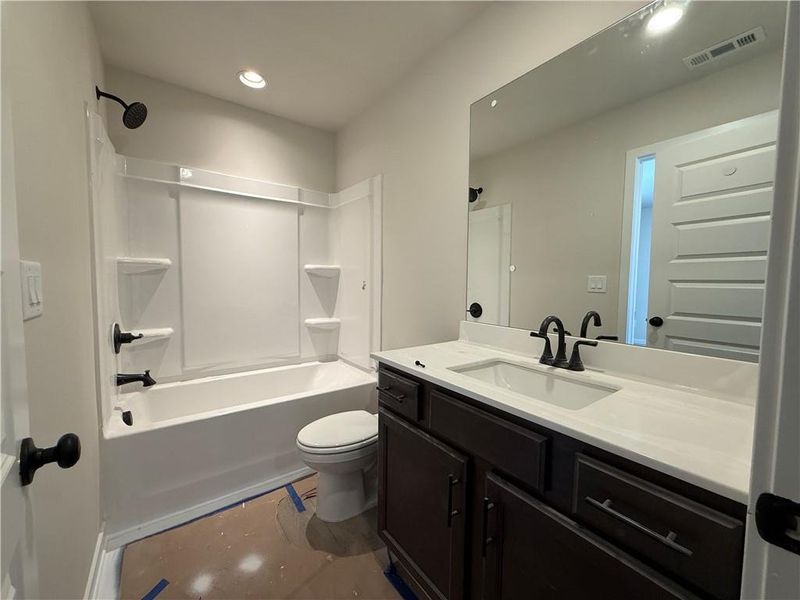 Furnished interior view inside a new home in The Towns at Auburn Station East, Auburn (Image 3).