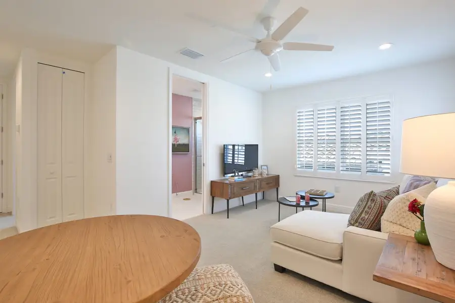 Representative furnished interior of a home built from the Lighthouse by Neal Communities in Boca Royale Golf & Country Club at Wellen Park, Englewood (Image 32).