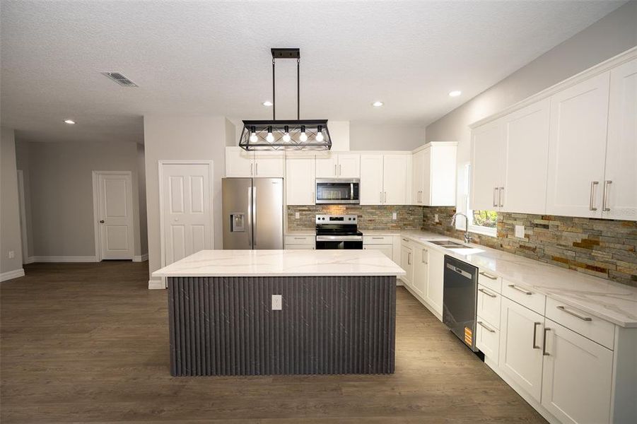 Furnished interior view inside a new home in , Deland (Image 11).