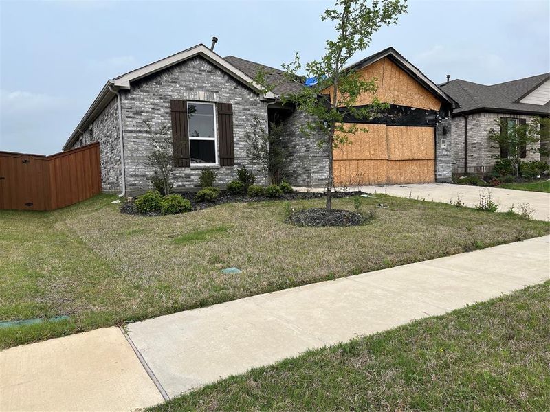 Front exterior of a new home in , Crandall, TX, highlighting curb appeal (Image 6).