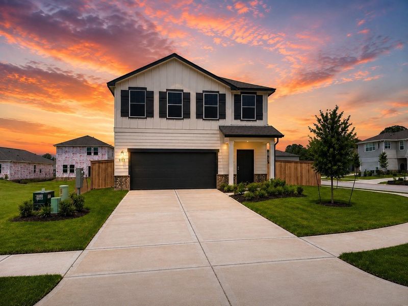 Front exterior of a new home in Stonebrooke, Conroe, TX, highlighting curb appeal (Image 13).