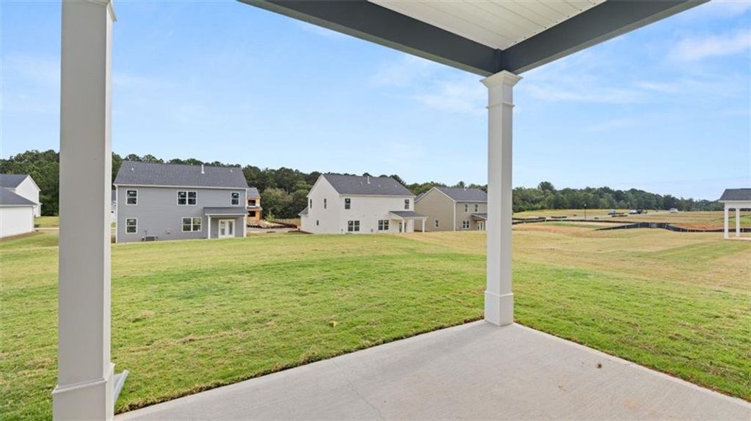 Exterior details and patio area of a home in Preserve at Dove Creek, Winder (Image 4).