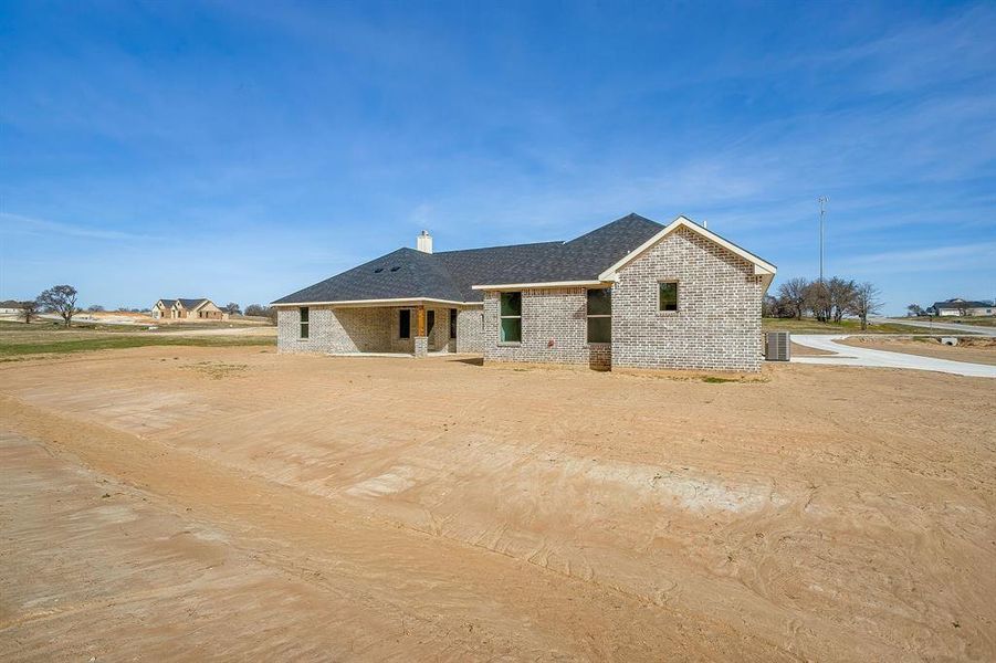 Exterior details and patio area of a home in , Poolville (Image 24).