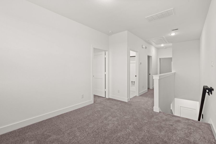 Spacious, unfurnished interior of a new home in Meridiana, Manvel (Image 22).