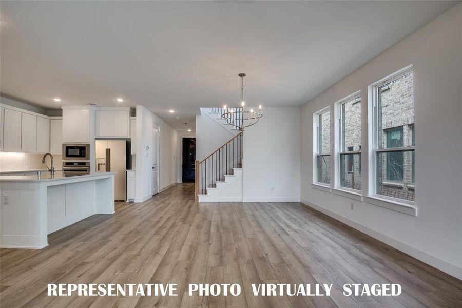 Your new dining room is the perfect place for a grand dinner party or cozy family meal!  REPRESENTATIVE PHOTO VIRTUALLY STAGED