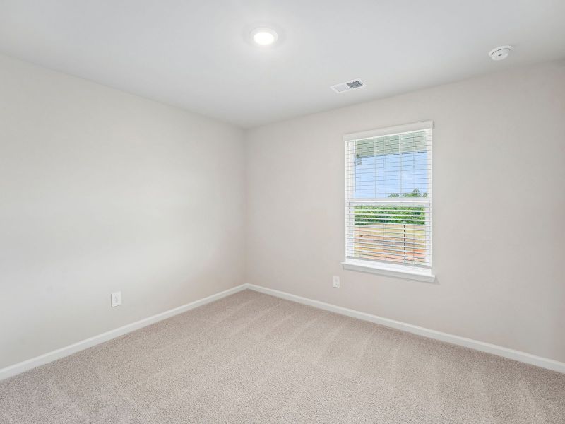 Spacious, unfurnished interior of a new home in Hemingway - Highland Series, Cumming (Image 22).