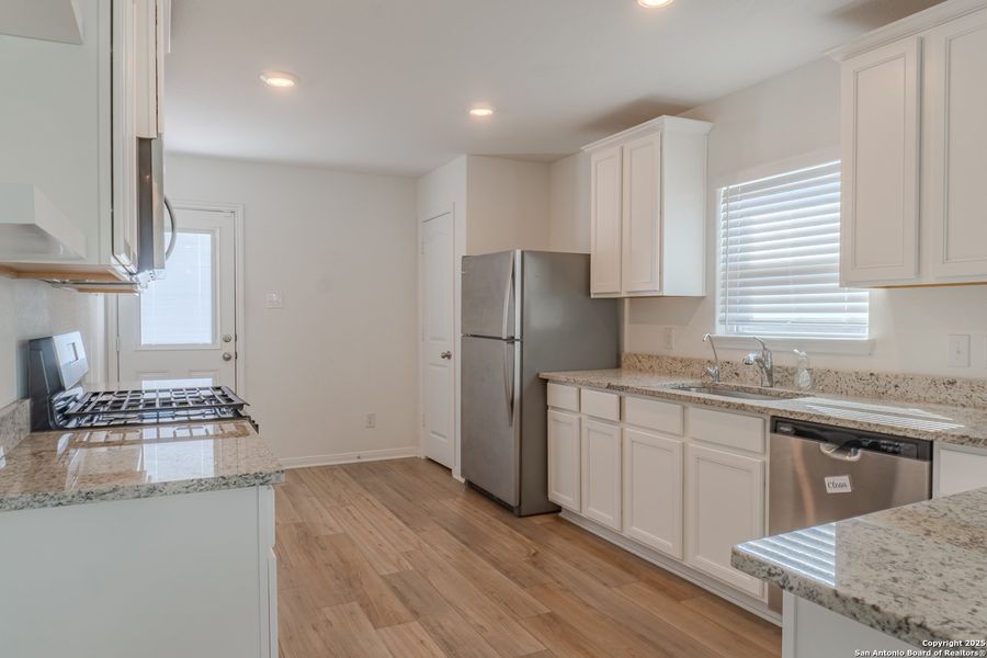 Furnished interior view inside a new home in Luckey Ranch, San Antonio (Image 6).