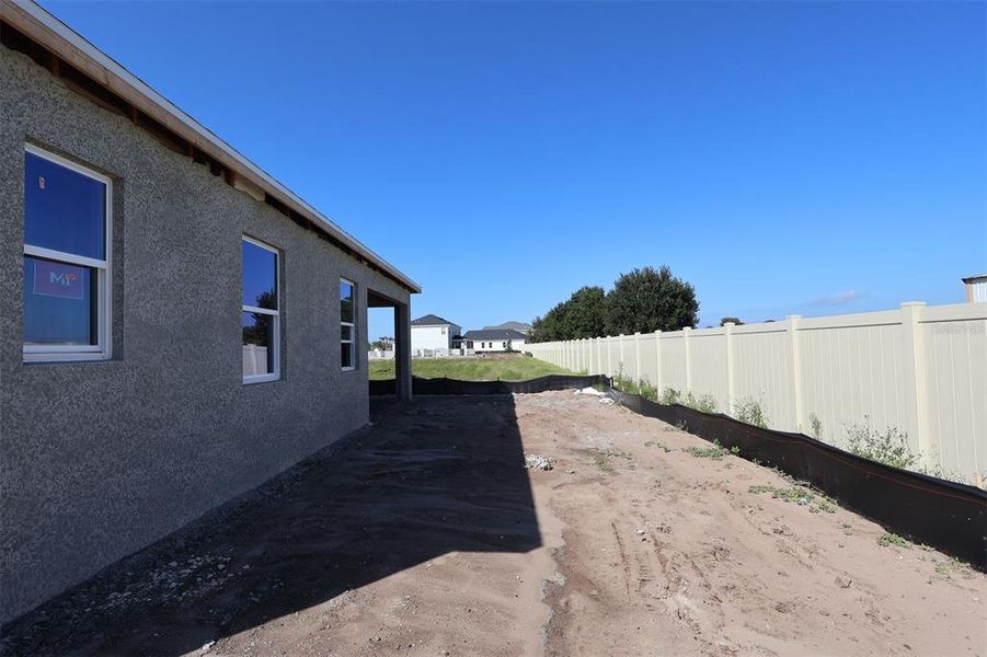Exterior details and patio area of a home in Bay Lake Farms, St. Cloud (Image 3).
