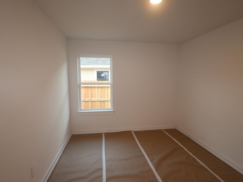 In-progress construction of a new home in Pinewood at Grand Texas, New Caney, TX (Image 10).