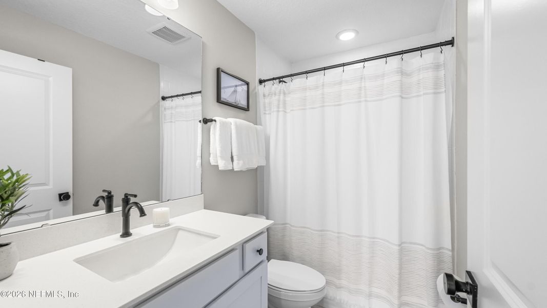 Furnished interior view inside a new home in Settler's Landing at Nocatee, Ponte Vedra (Image 11).