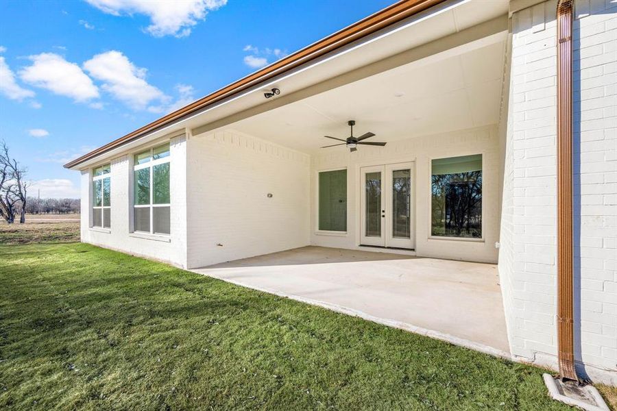 Front exterior of a new home in Rolling Creek Ranch, Aledo, TX, highlighting curb appeal (Image 22). Front exterior of a new home in Rolling Creek Ranch, Aledo, TX, highlighting curb appeal (Image 22).