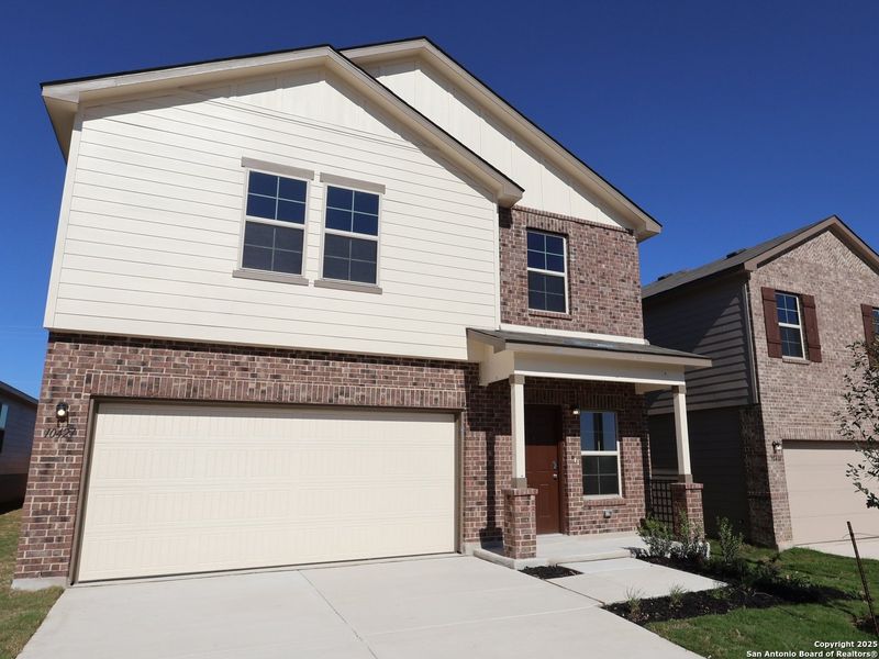 Front exterior of a new home in Paloma Park, Converse, TX, highlighting curb appeal (Image 2). Front exterior of a new home in Paloma Park, Converse, TX, highlighting curb appeal (Image 2).