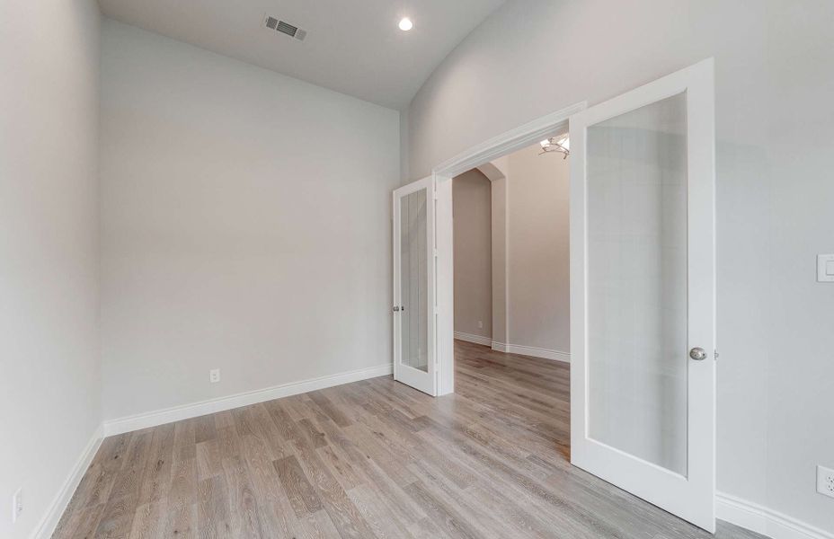 Representative unfurnished interior of a home built from the 3049 by Ravenna Homes in The Woodlands Hills 65′, Willis (Image 20). Representative unfurnished interior of a home built from the 3049 by Ravenna Homes in The Woodlands Hills 65′, Willis (Image 20).