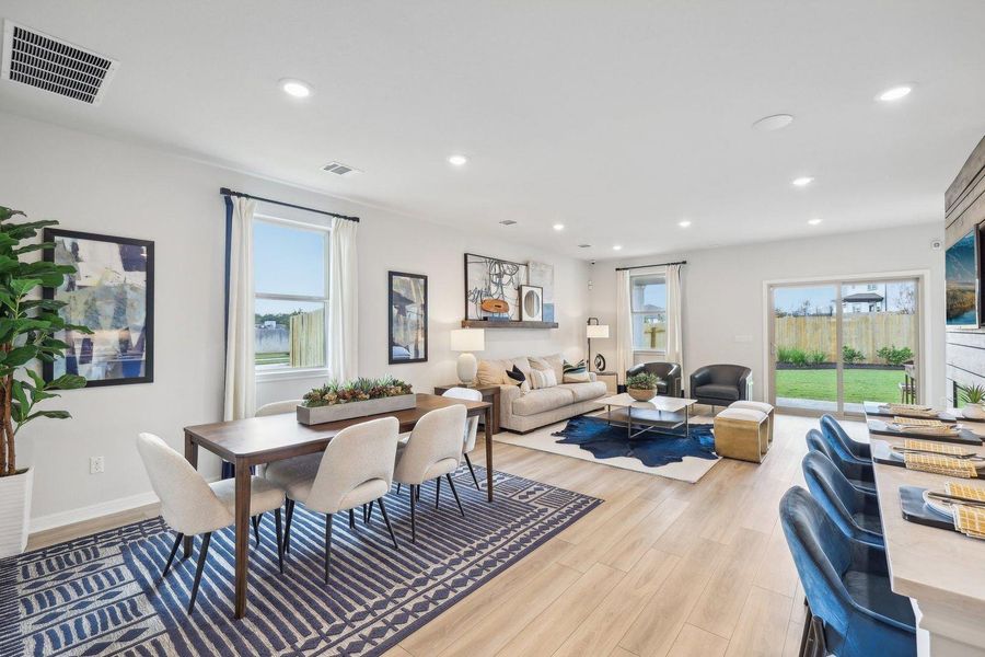 Natural light illuminates this open-concept layout, perfect for entertaining. Natural light illuminates this open-concept layout, perfect for entertaining.