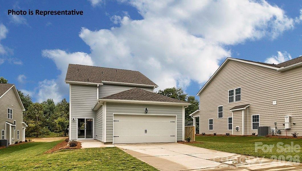 Front exterior of a new home in Oak Grove Hill, Huntersville, NC, highlighting curb appeal (Image 8).