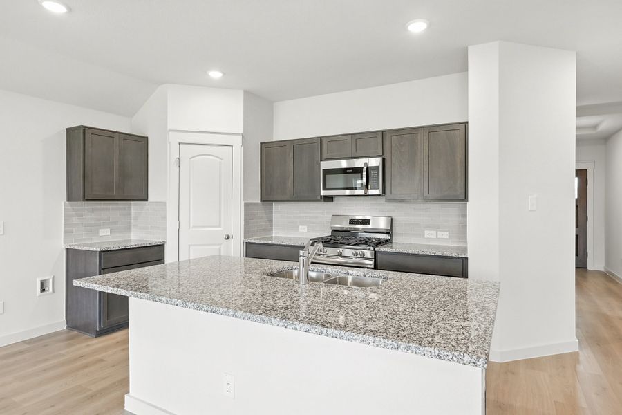 Representative furnished interior of a home built from the Landmark Series - Avalon by Brightland Homes in Still Water Lake Estates, Godley (Image 12). Representative furnished interior of a home built from the Landmark Series - Avalon by Brightland Homes in Still Water Lake Estates, Godley (Image 12).