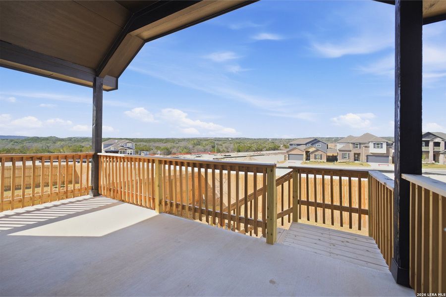 Exterior details and patio area of a home in The Woodlands at Medina Hills, Mico (Image 3).