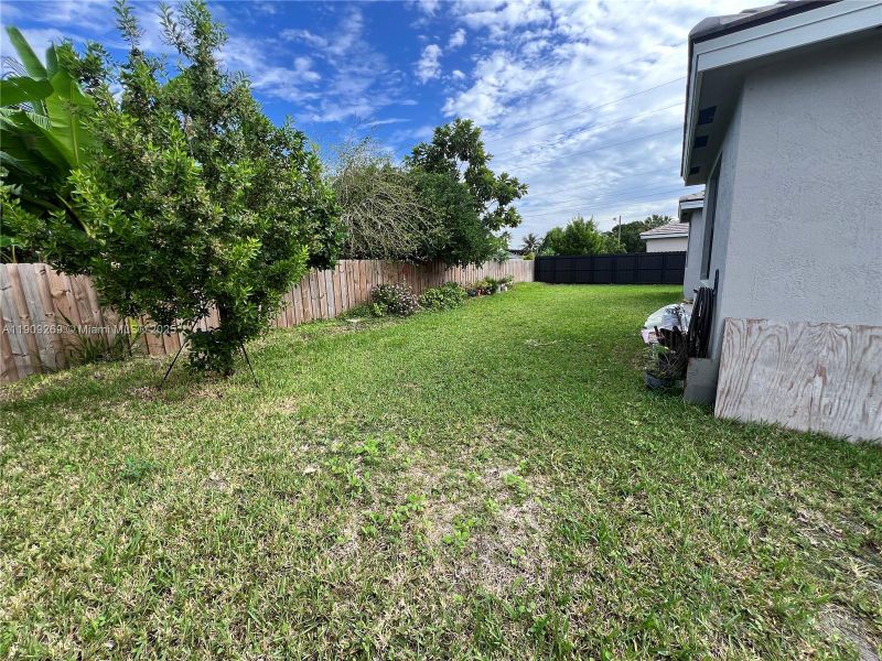 Exterior details and patio area of a home in , Homestead (Image 17). Exterior details and patio area of a home in , Homestead (Image 17).