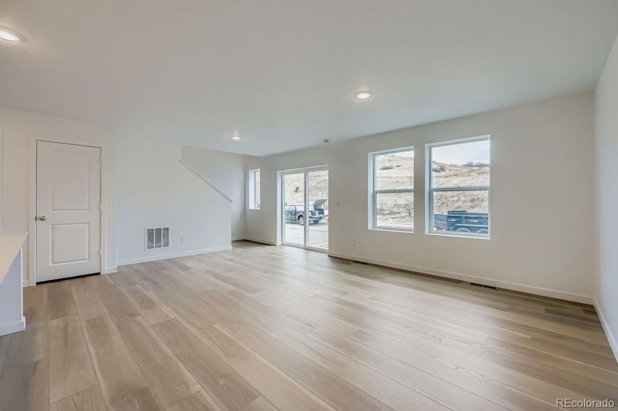 Spacious, unfurnished interior of a new home in Preserve at Mesa Creek: The Celestial Collection, Colorado Springs (Image 9).