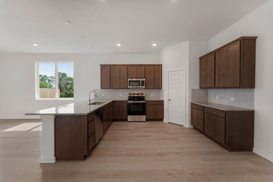 Furnished interior view inside a new home in Pecan Grove, Navasota (Image 3).