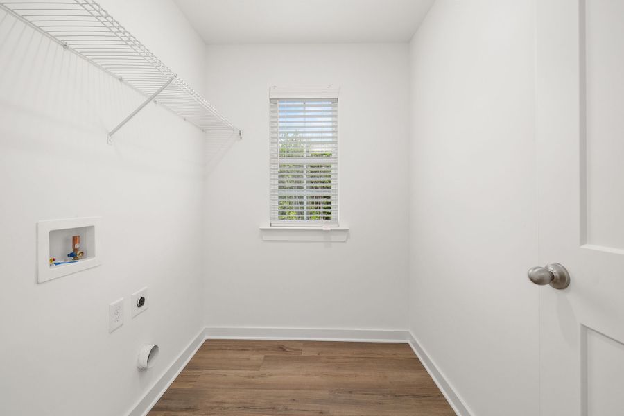 Laundry room located upstairs