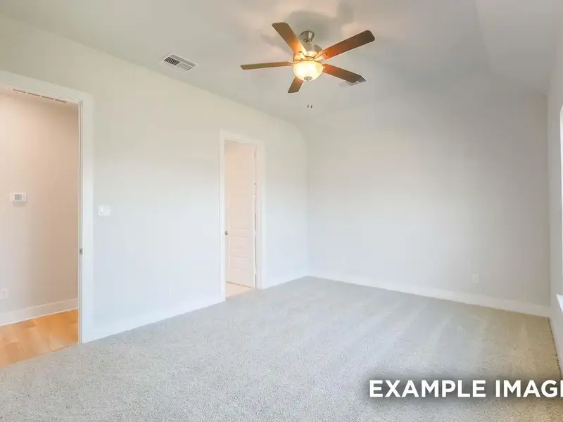 Spacious, unfurnished interior of a new home in Sunterra, Katy (Image 17).