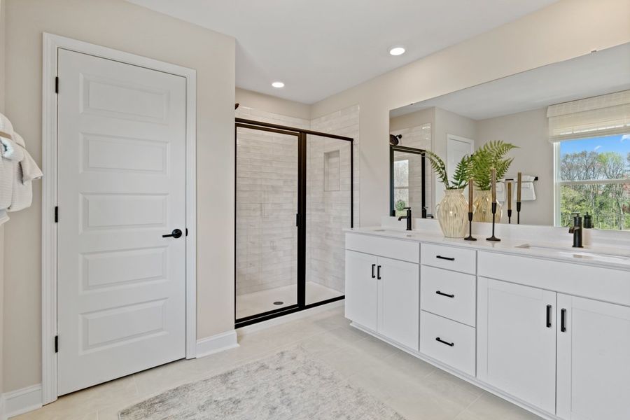 Optional walk-in shower with tile surround at primary bath Optional walk-in shower with tile surround at primary bath