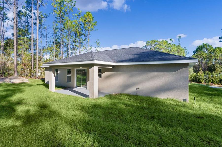 Exterior details and patio area of a home in , Citrus Springs (Image 25).