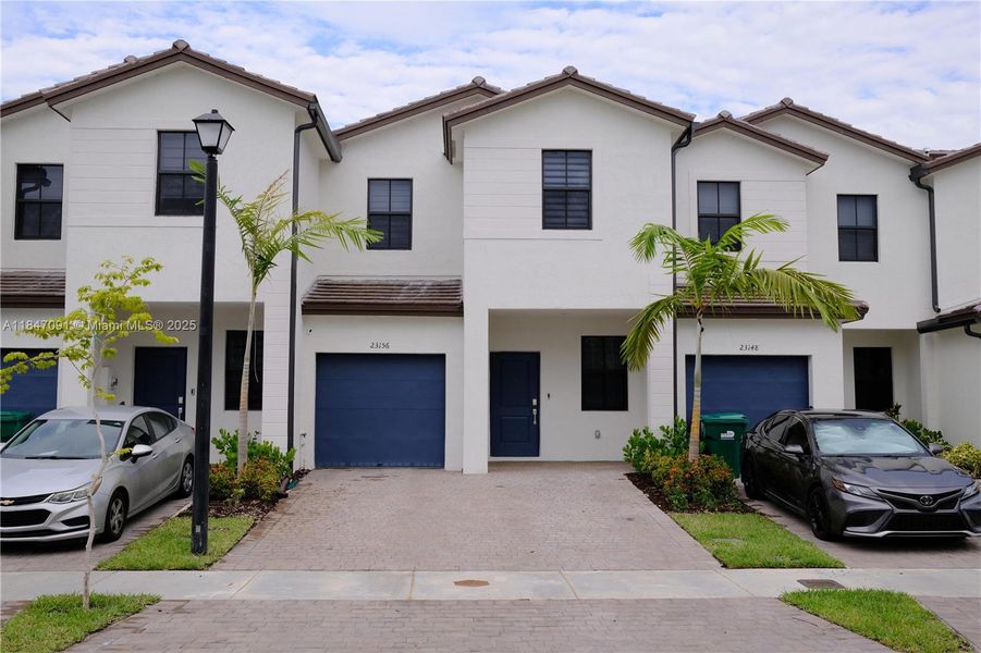 Front exterior of a new home in , Miami, FL, highlighting curb appeal (Image 19).