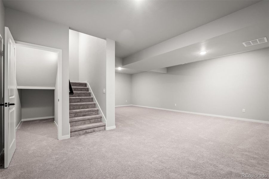 Spacious, unfurnished interior of a new home in Revel Crossing at Wolf Ranch – The Outlook Collection, Colorado Springs (Image 31).