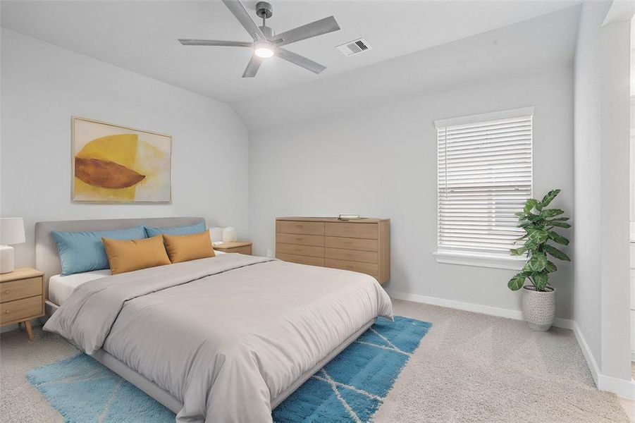 Secondary bedroom features plush carpet, custom paint, high ceilings with ceiling fan and a large window with privacy blinds.