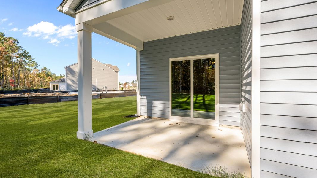 Exterior details and patio area of a home in West New Bern, New Bern (Image 4).