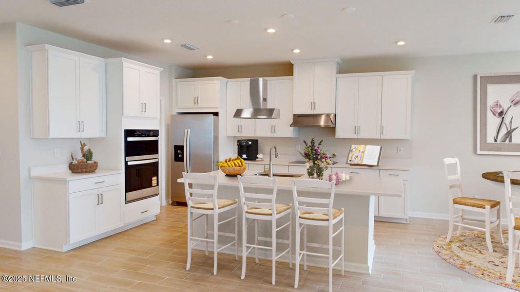 Furnished interior view inside a new home in Lakes at Bella Lago, Green Cove Springs (Image 3).