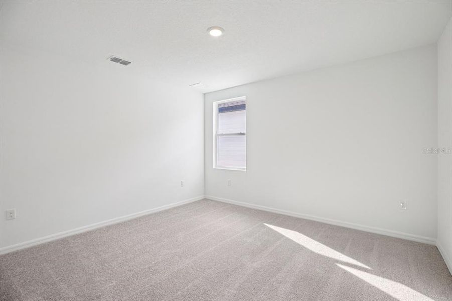 Spacious, unfurnished interior of a new home in Northlake at Ovation, Winter Garden (Image 21).