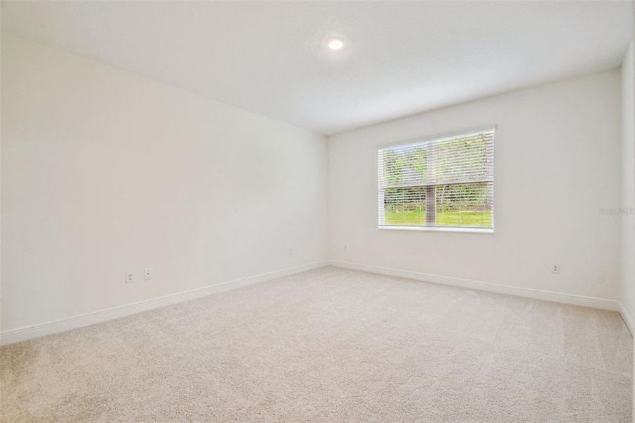 Spacious, unfurnished interior of a new home in Hidden Ridge, New Port Richey (Image 32).