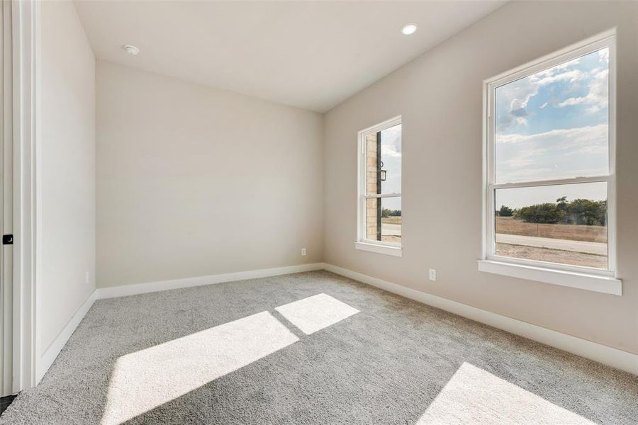 Empty room featuring carpet flooring