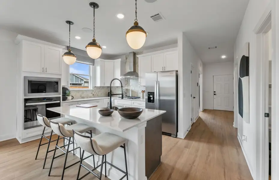Furnished interior view inside a new home in Crosswinds, Kyle (Image 6).