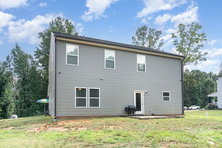 Front exterior of a new home in , Gastonia, NC, highlighting curb appeal (Image 2). Front exterior of a new home in , Gastonia, NC, highlighting curb appeal (Image 2).